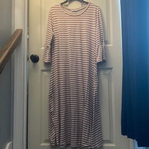 Women’s Reborn J dress size large with POCKETS and a ruffle sleeve.